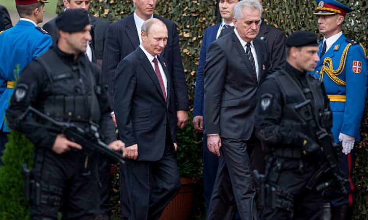 Belgrade, Serbia - October 16, 2014: Russian President Vladimir Putin and Serbian President Tomislav Nikolić  during the military parade "March of the victorious" in Belgrade. President Vladimir Putin of Russia arrived in Belgrade to commemorate the city’s liberation by the Red Army and Yugoslav Partisans in 1944. during World War II.