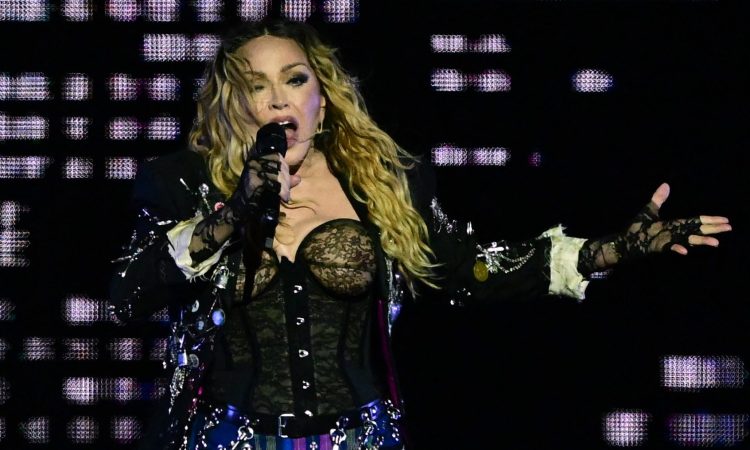 TOPSHOT - US pop star Madonna performs onstage during a free concert at Copacabana beach in Rio de Janeiro, Brazil, on May 4, 2024. . Madonna ended her "The Celebration Tour" with a performance attended by some 1.5 million enthusiastic fans. (Photo by Pablo PORCIUNCULA / AFP) (Photo by PABLO PORCIUNCULA/AFP via Getty Images)