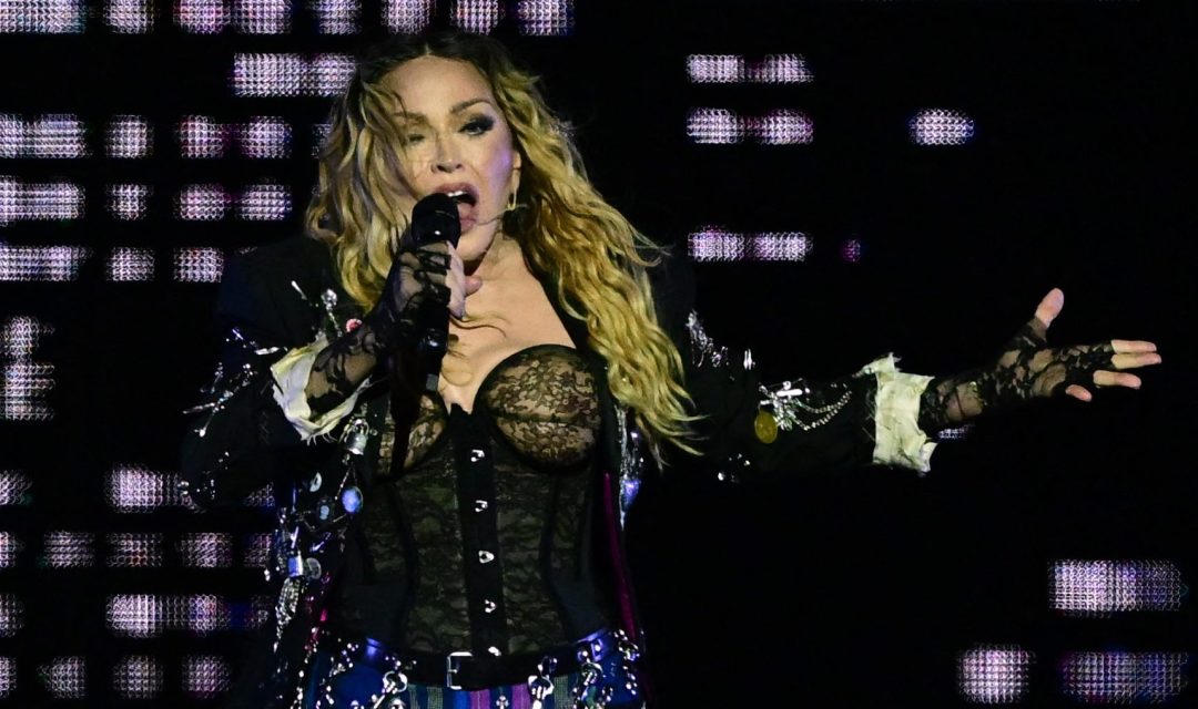 TOPSHOT - US pop star Madonna performs onstage during a free concert at Copacabana beach in Rio de Janeiro, Brazil, on May 4, 2024. . Madonna ended her "The Celebration Tour" with a performance attended by some 1.5 million enthusiastic fans. (Photo by Pablo PORCIUNCULA / AFP) (Photo by PABLO PORCIUNCULA/AFP via Getty Images)