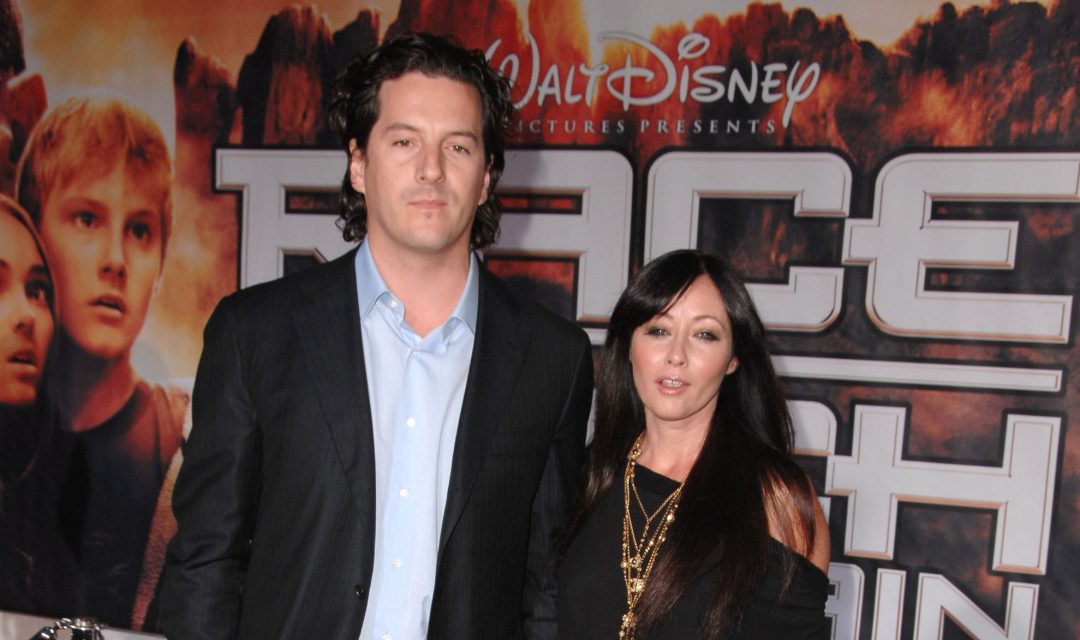 HOLLYWOOD - MARCH 11: Shannen Doherty and Kurt Iswarienko  arrive at the Los Angeles premiere of "Race To Witch Mountain"  at the El Capitan Theatre on March 11, 2009 in Hollywood, California. (Photo by Steve Granitz/WireImage)