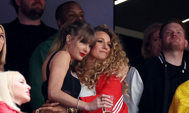 Taylor Swift hugging Blake Lively at a Chiefs game