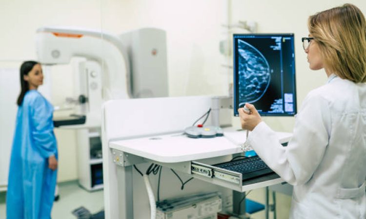 Young woman is having mammography examination at the hospital or private clinic with a professional female doctor.