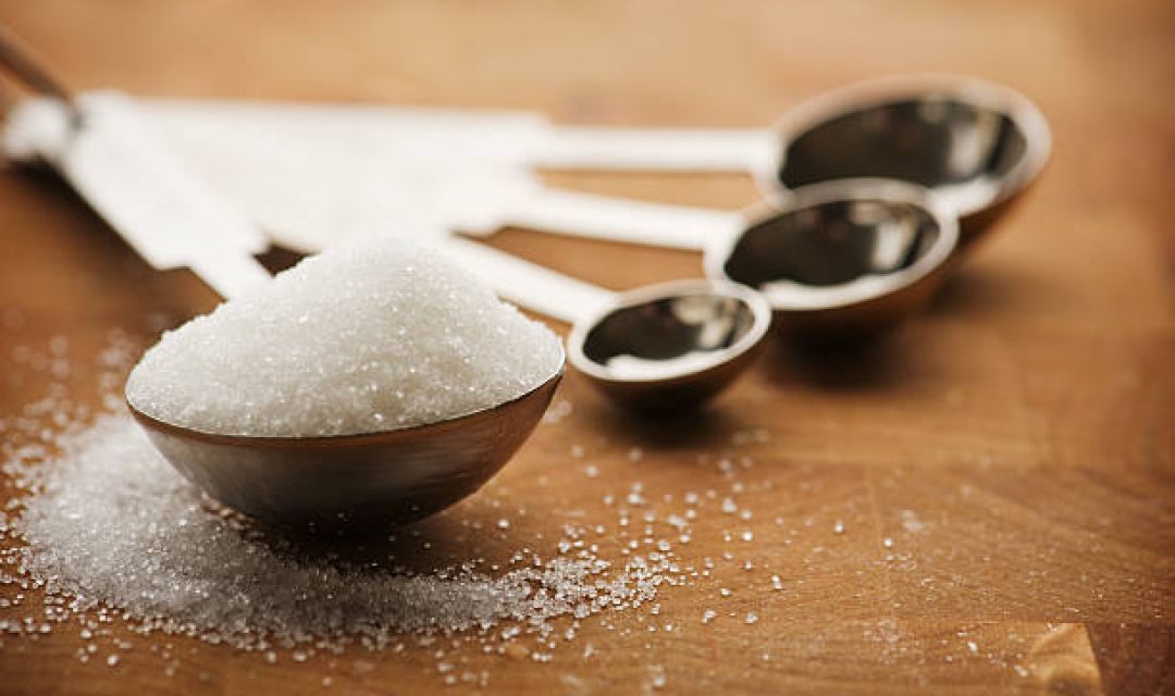 Tablespoon filled with granulated sugar